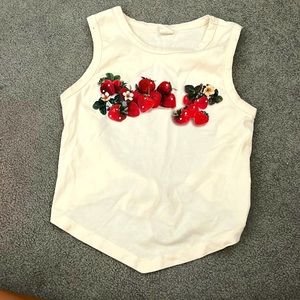 strawberry tank with cut in the back